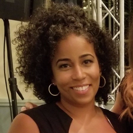 Headshot of Karines Reyes